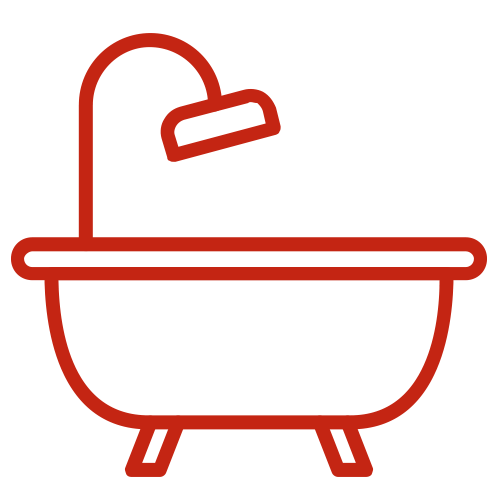 Red outline icon of a bathtub with a showerhead on a light background.